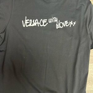 Versace solid black gorgeous T.shirt with white print